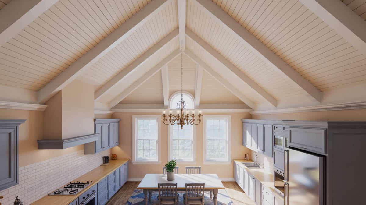 Country kitchen with rustic open beam ceiling and white cabinets