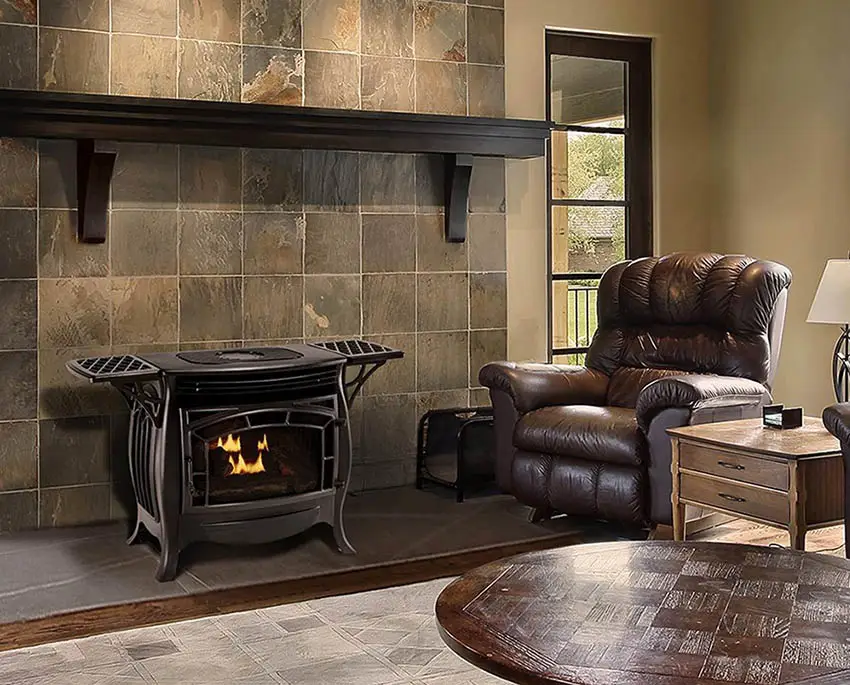 Portable fireplace beside leather armchair and sidetable