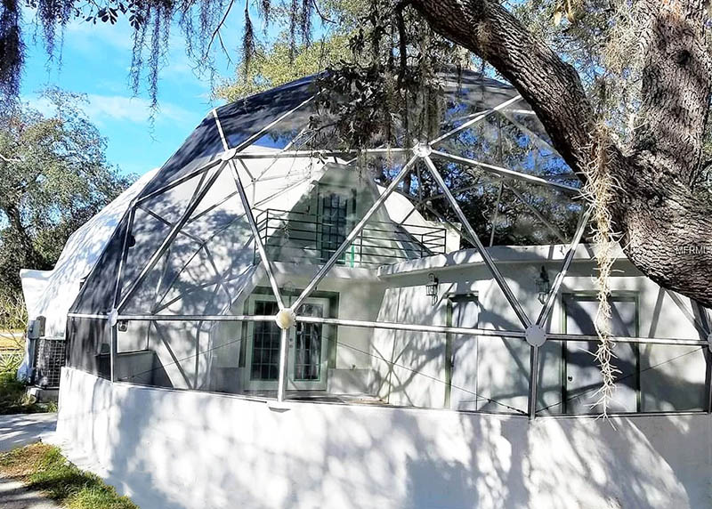 Glass geodesic dome house