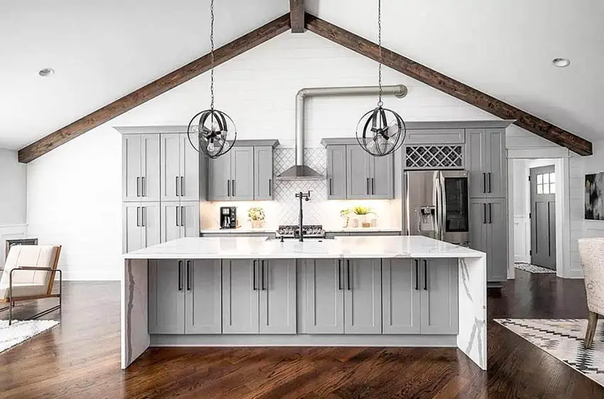 Kitchen with cathedral ceiling gray cabinets quartz countertops