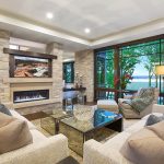 Luxury living room with gas fireplace and stone pillars