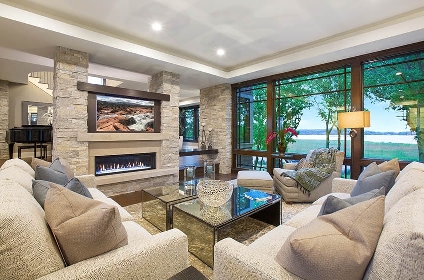 Luxury living room with gas fireplace and stone pillars