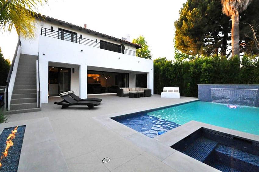 White stucco finish house with swimming pool