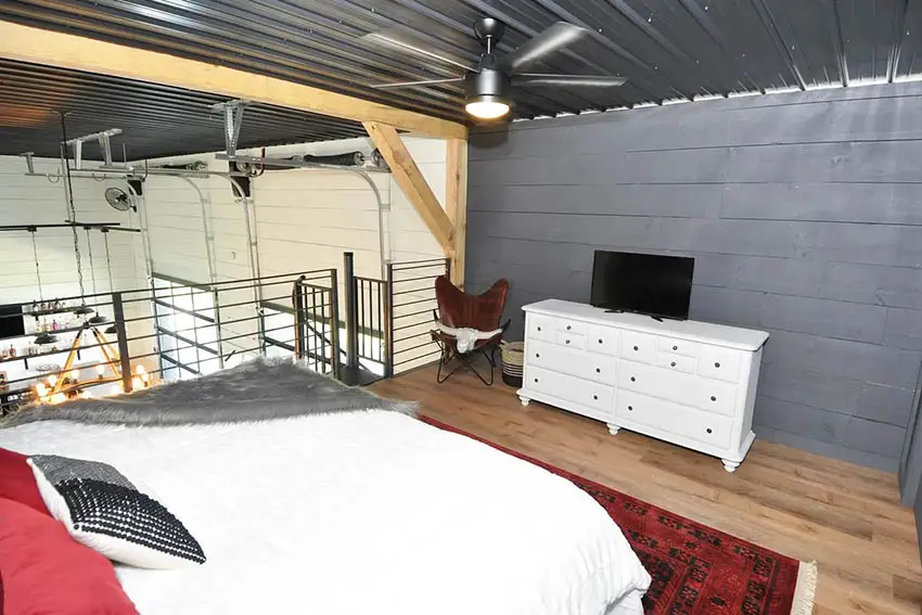 Loft bedroom with corrugated ceiling