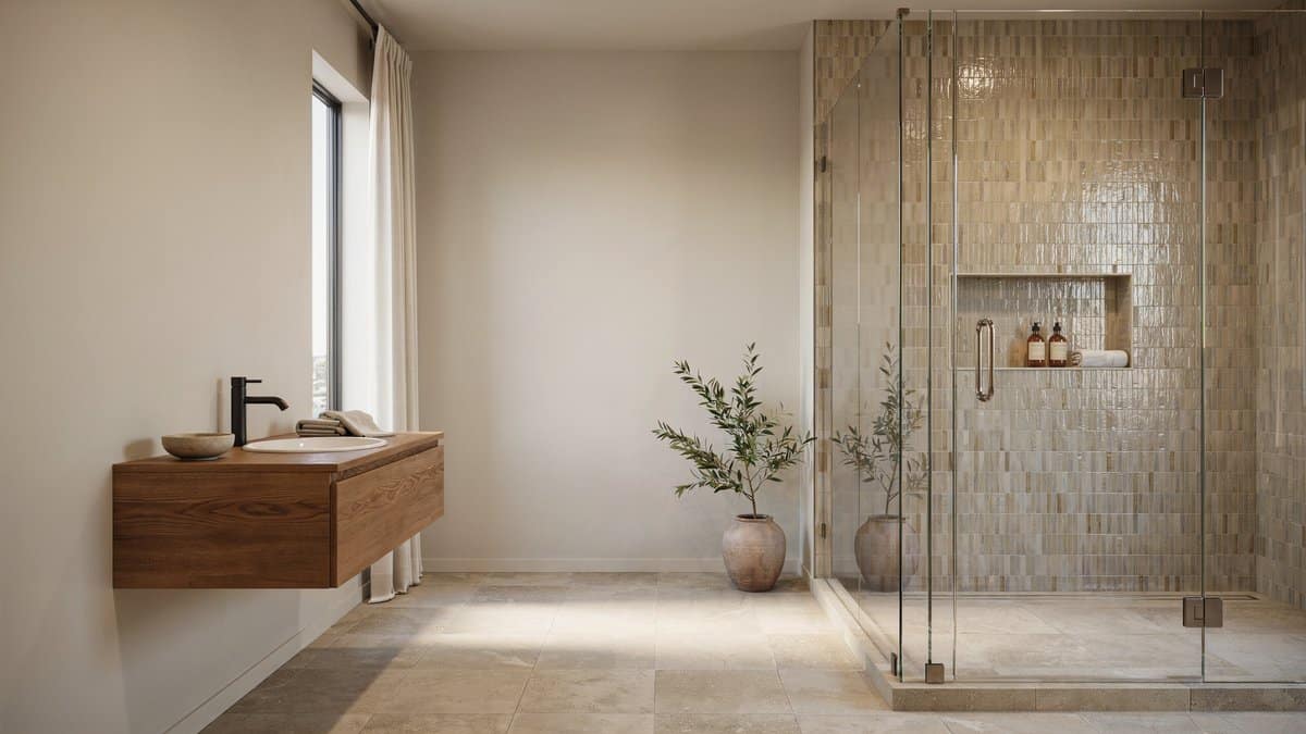 Warm greige walls with beige floor tile and a mosaic tile shower