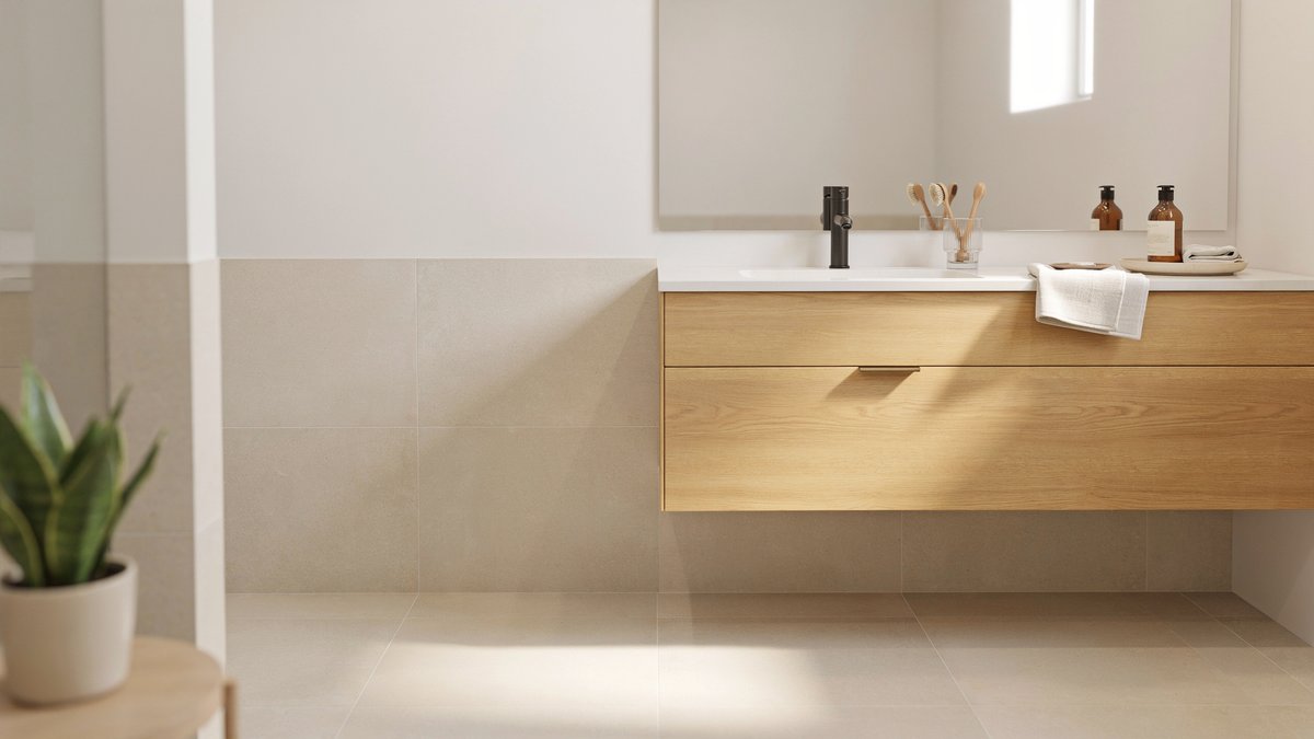 Warm white walls paired with light beige bathroom floor tile