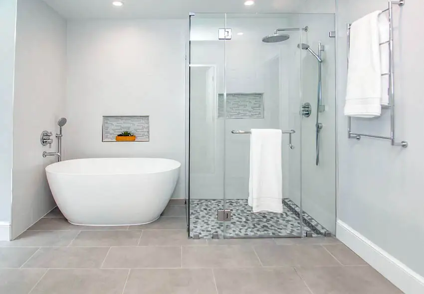 Bathroom with light gray wall paint and beige floor tile