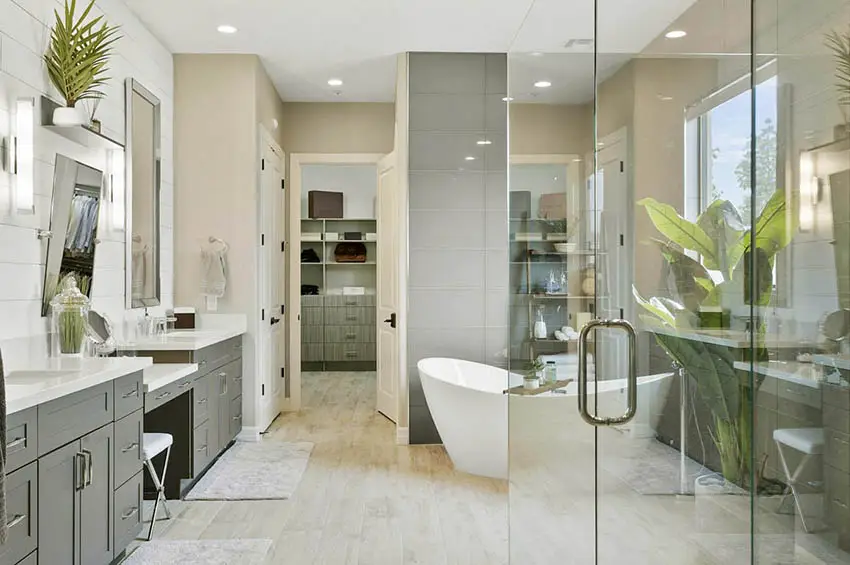 Contemporary bathroom with beige floor tile shiplap and beige wall paint
