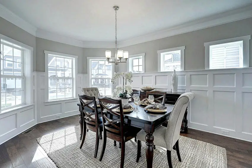 Dining room with casement windows white wainscoting