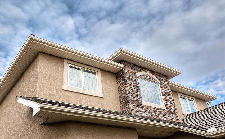 House with lace stucco finish