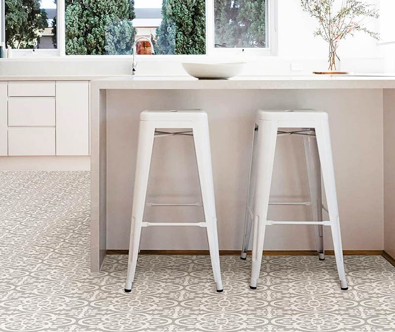 Kitchen with adhesive tiles