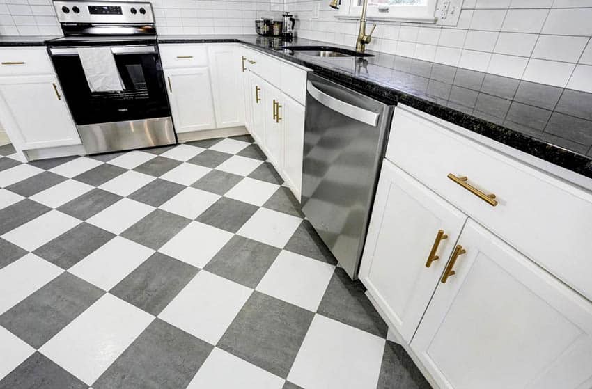 Kitchen with black and white floor tile design