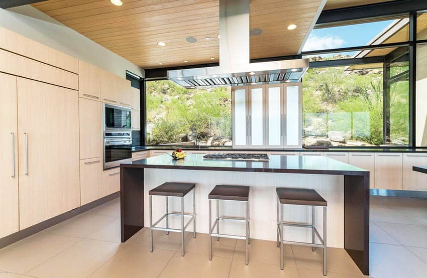 Kitchen with ceramic tile and wood plank ceiling