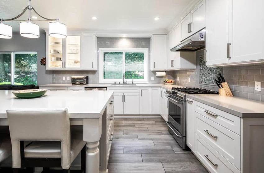 Kitchen With Wood Tile Floor White Cabinets 