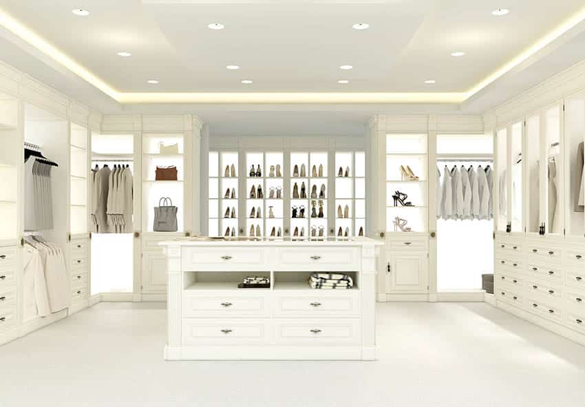 Large walk-in closet with lighted shoe rack and island