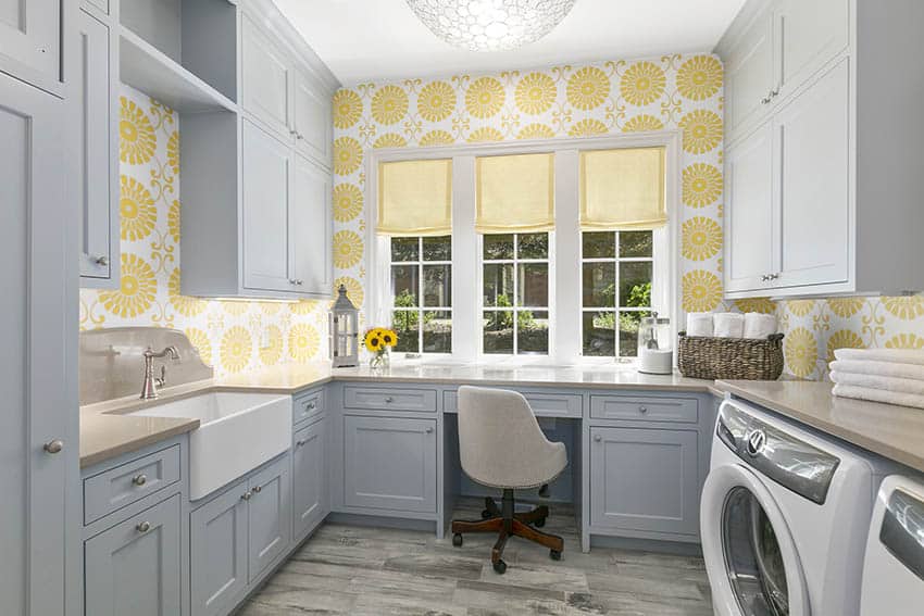 Laundry cabinets and seating area with wraparound countertop