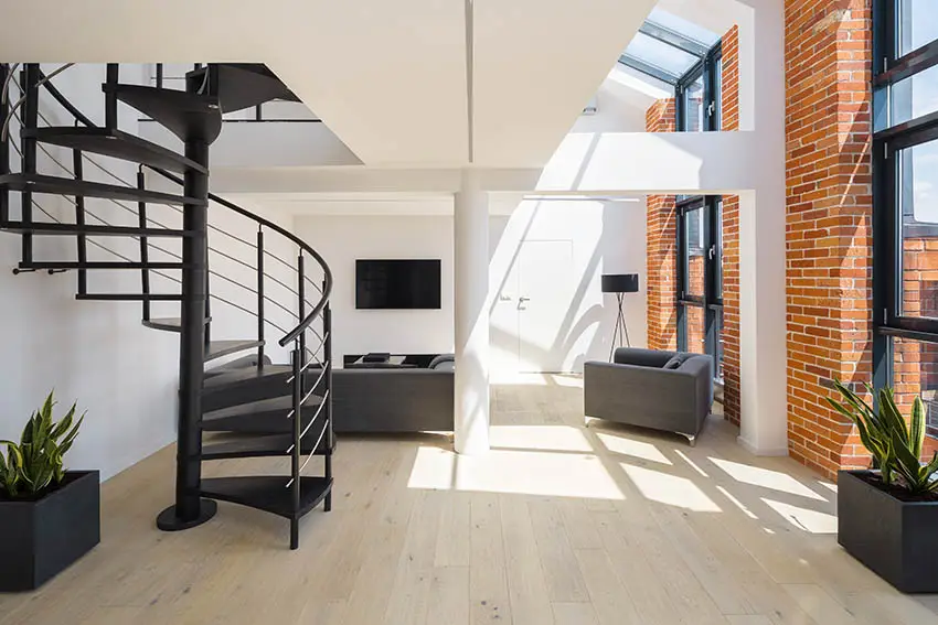 Loft with metal circular stairs