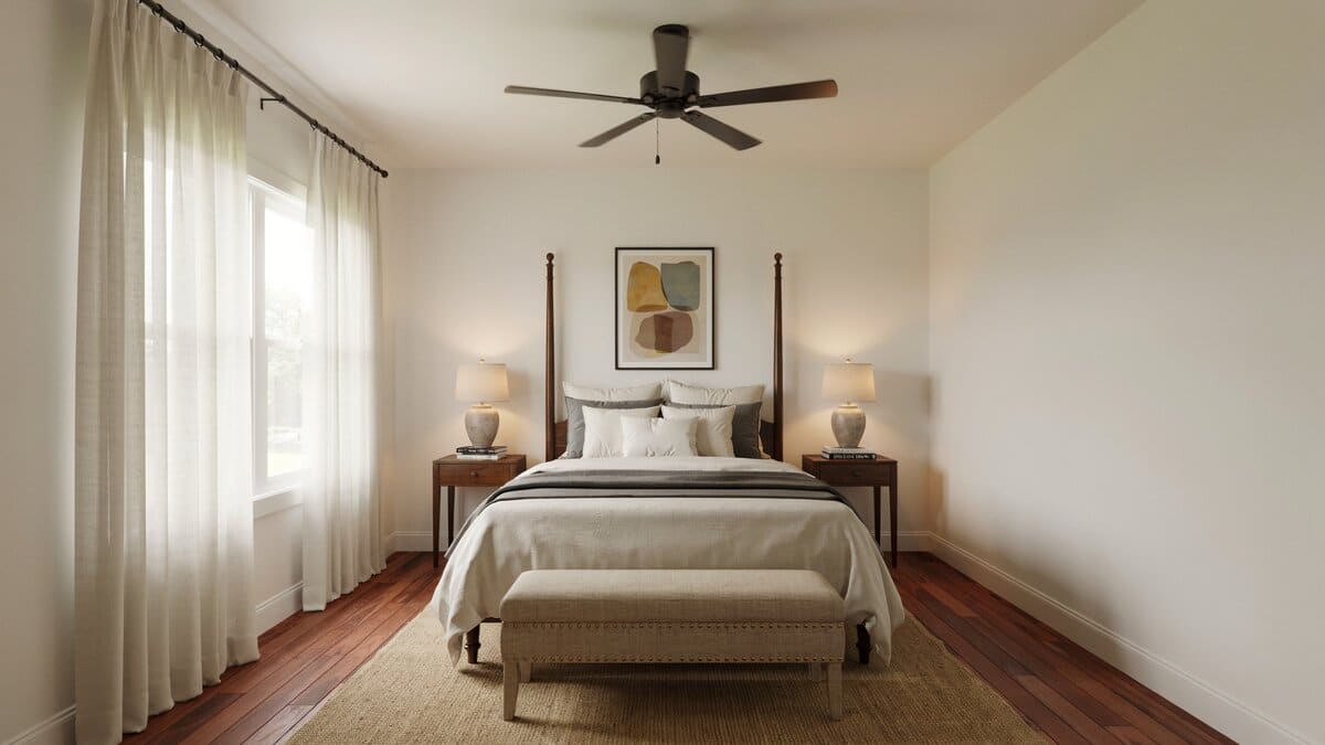 Master bedroom with four poster bed, ceiling fan and matching nightstand lamps