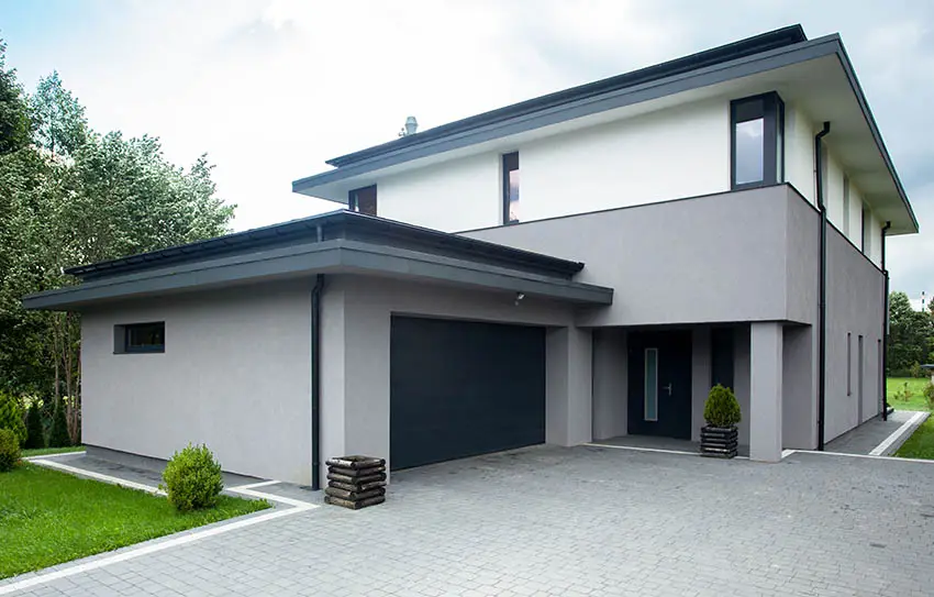 House with gray stucco and smooth exterior
