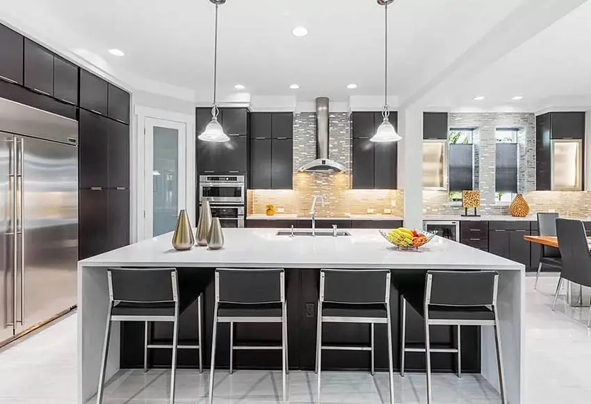 Kitchen with decorative metal backsplash