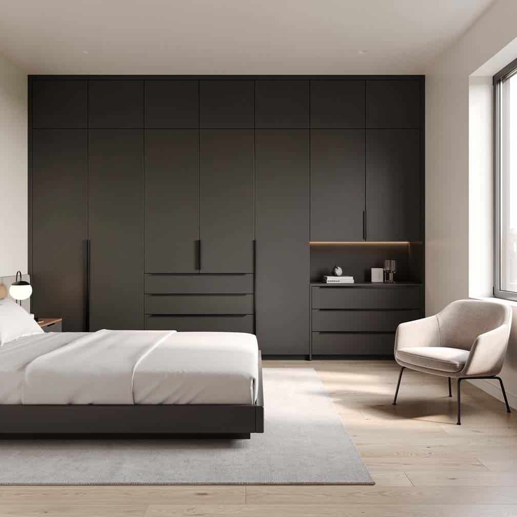Floor-to-ceiling built-in closet and dresser system in a sleek modern master bedroom