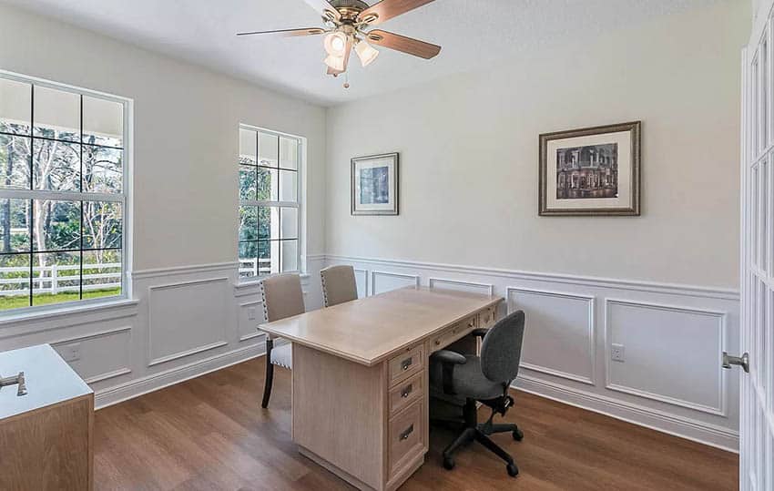 North facing home office with sherwin williams summer white paint and wainscoting