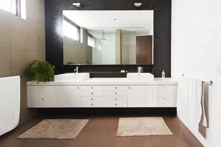 Bathroom With Double Sink Vanity Black Accent Wall And Towel Bar 728x486 