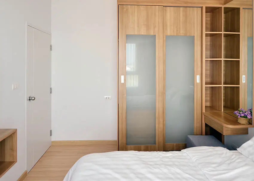 Bedroom with built in wood wardrobe