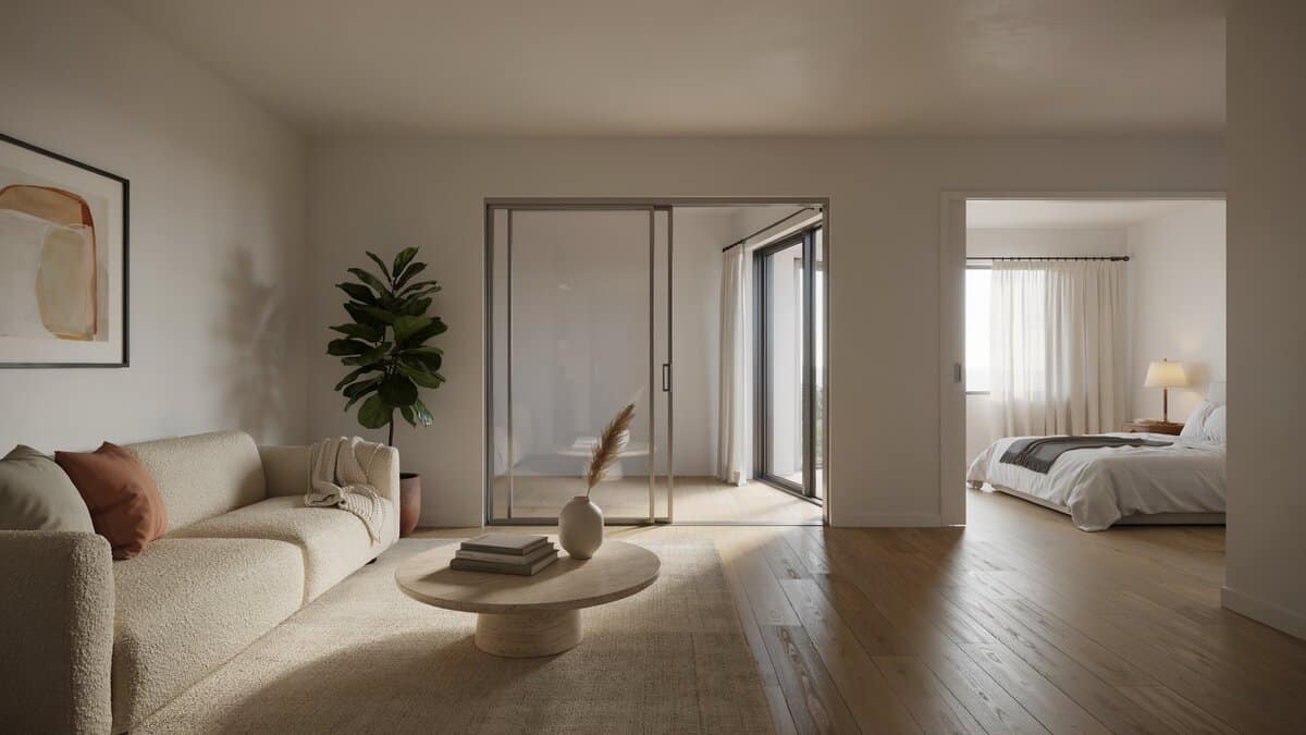 Contemporary living room with sliding glass doors opening into a bright bedroom