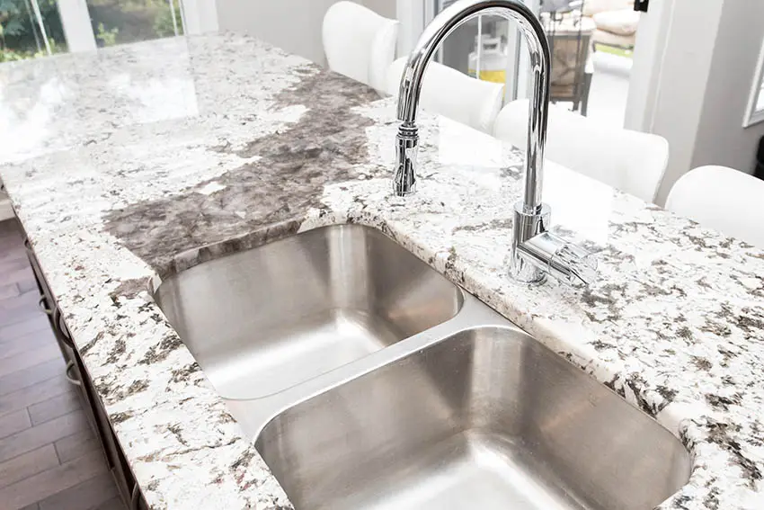Double basin sink with granite countertops