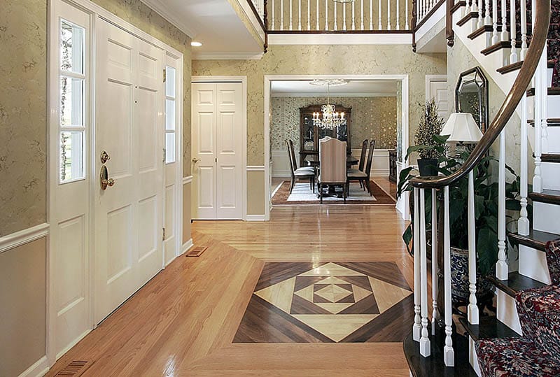 Foyer with wood floor inlay pattern design