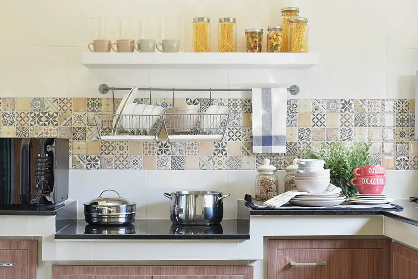 Kitchen with colorful ceramic backsplash