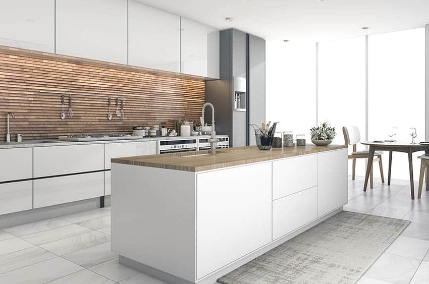 Modern kitchen with metal backsplash white cabinets