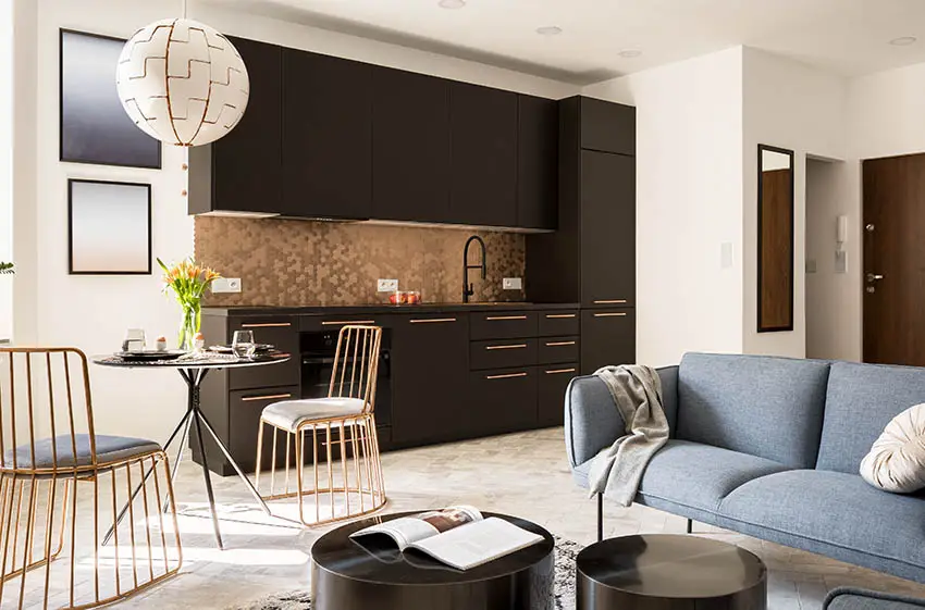 Small modern kitchen with gold metal hexagon backsplash