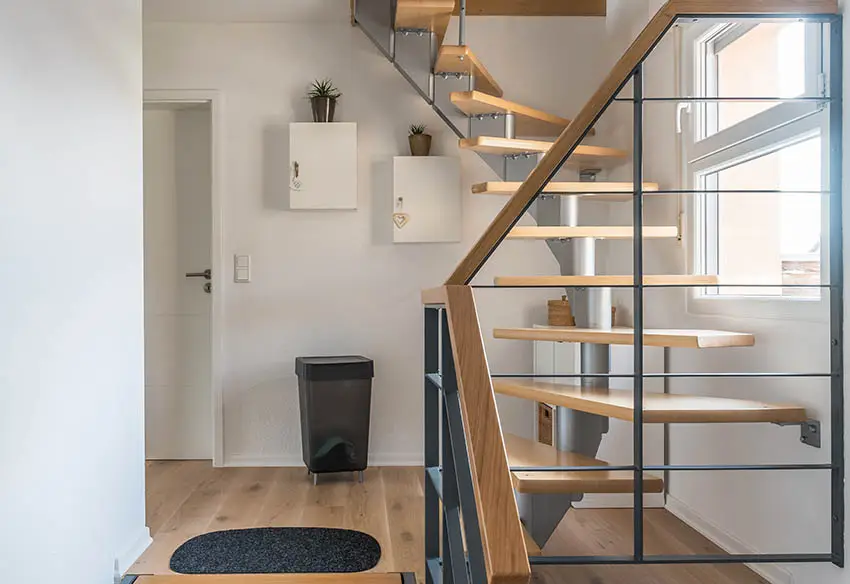 Space saving spiral staircase with wood steps