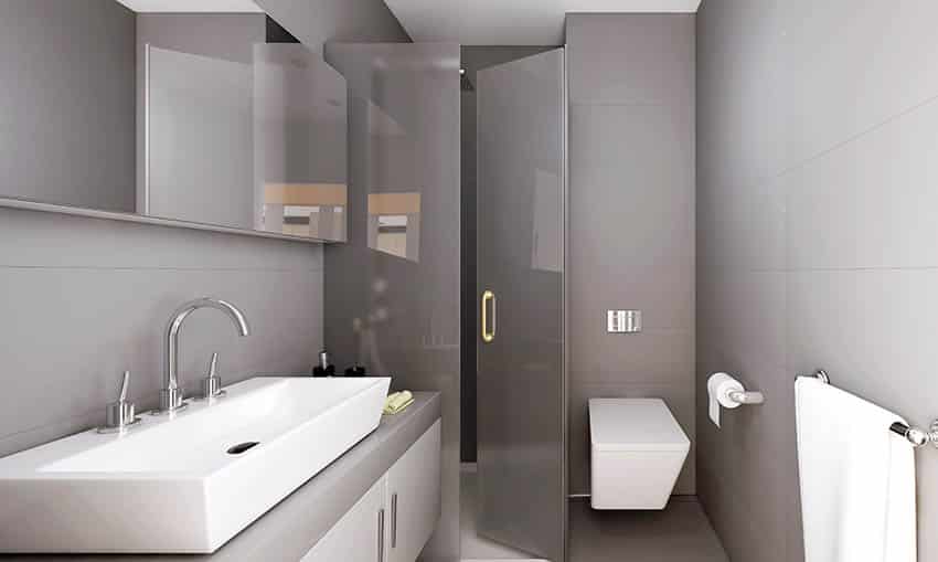 Toilet paper holder placement in small modern bathroom