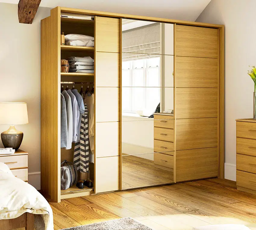 Wood wardrobe in bedroom with mirror