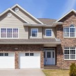 Brick house with tan paint color