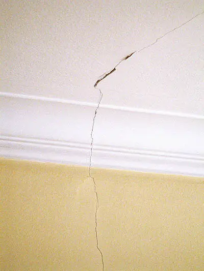 Crack running across wall and ceiling