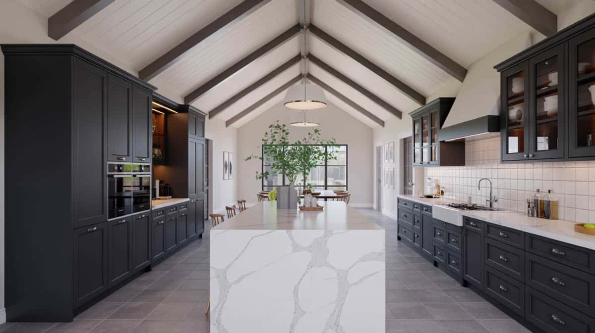 Open-plan kitchen with ebony black cabinets, Carrara marble countertops, and a dramatic high-slope ceiling