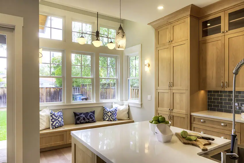 Kitchen with traditional transom windows window seat