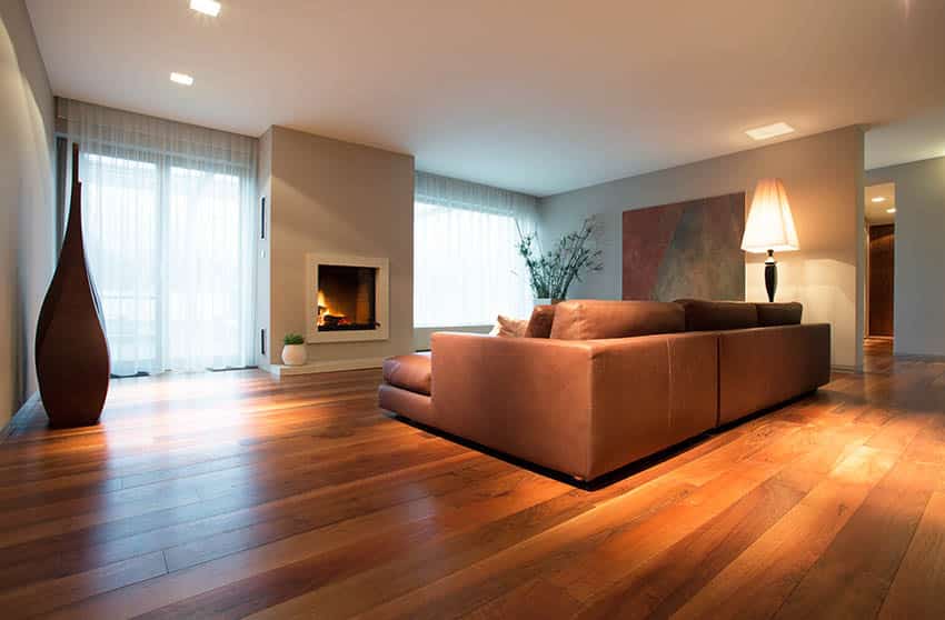 Living room with cherry wood floors light gray paint 