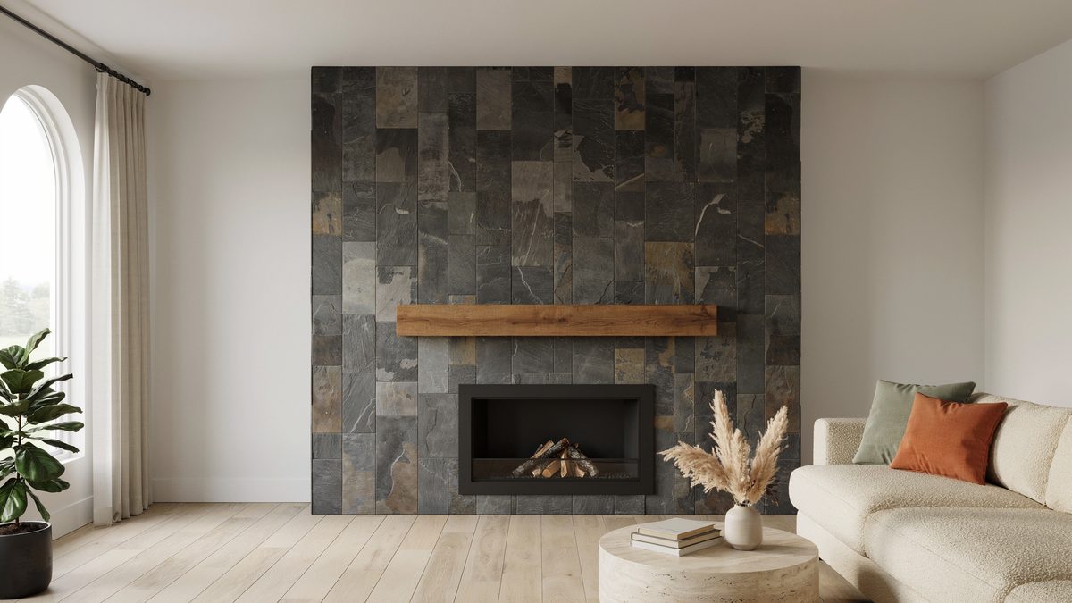 Slate mosaic tile fireplace wall with a thick oak mantel floating above the firebox