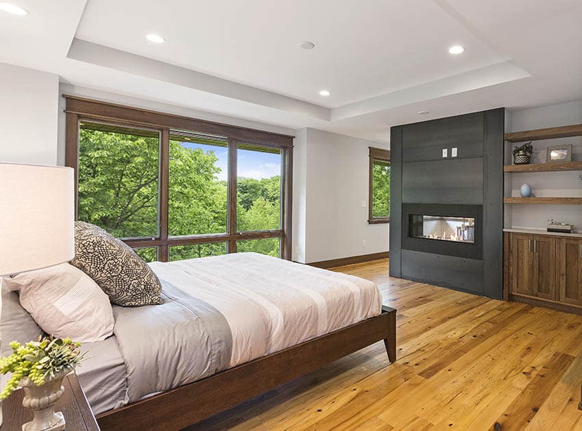 Master bedroom with wood frame windows
