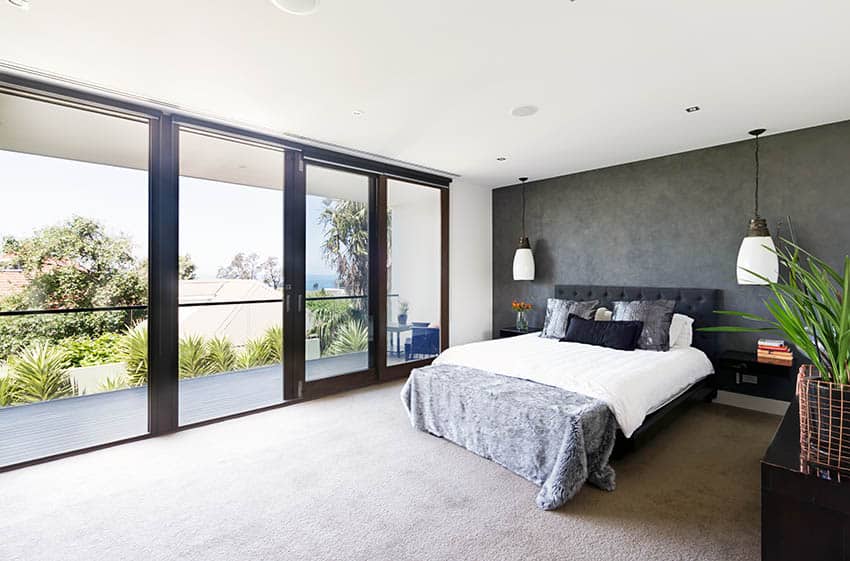 Modern bedroom with sliding glass doors