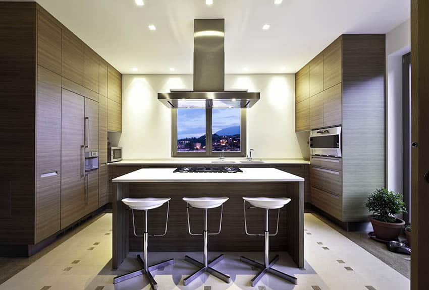 Modern kitchen with sliding window above sink wood veneer cabinets white quartz island