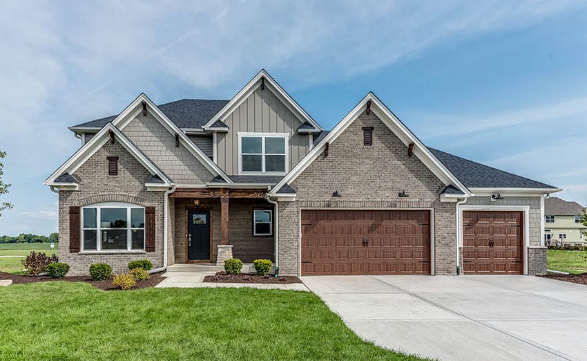 New construction home with gray bricks and wall paint