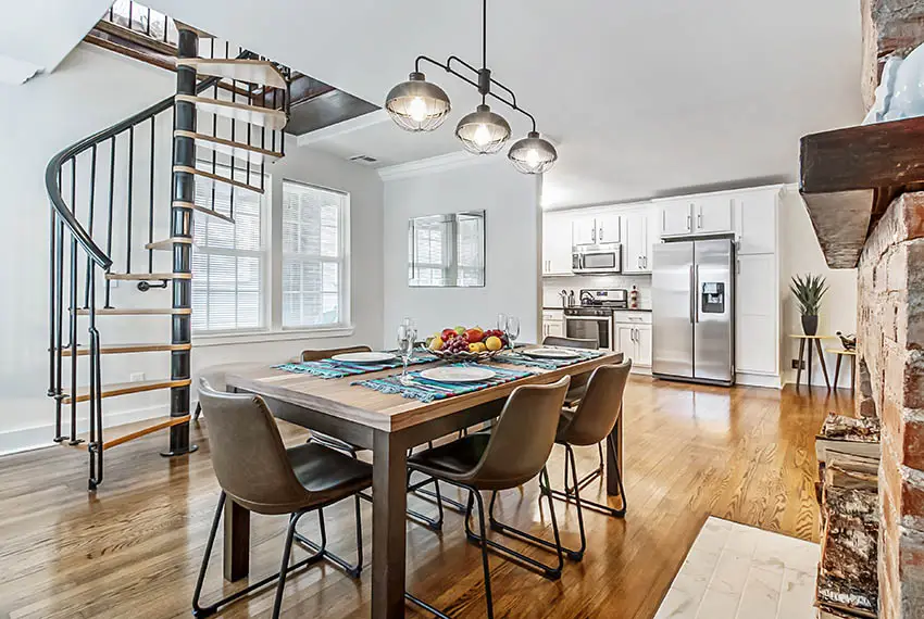 Open concept interior with spiral staircase 