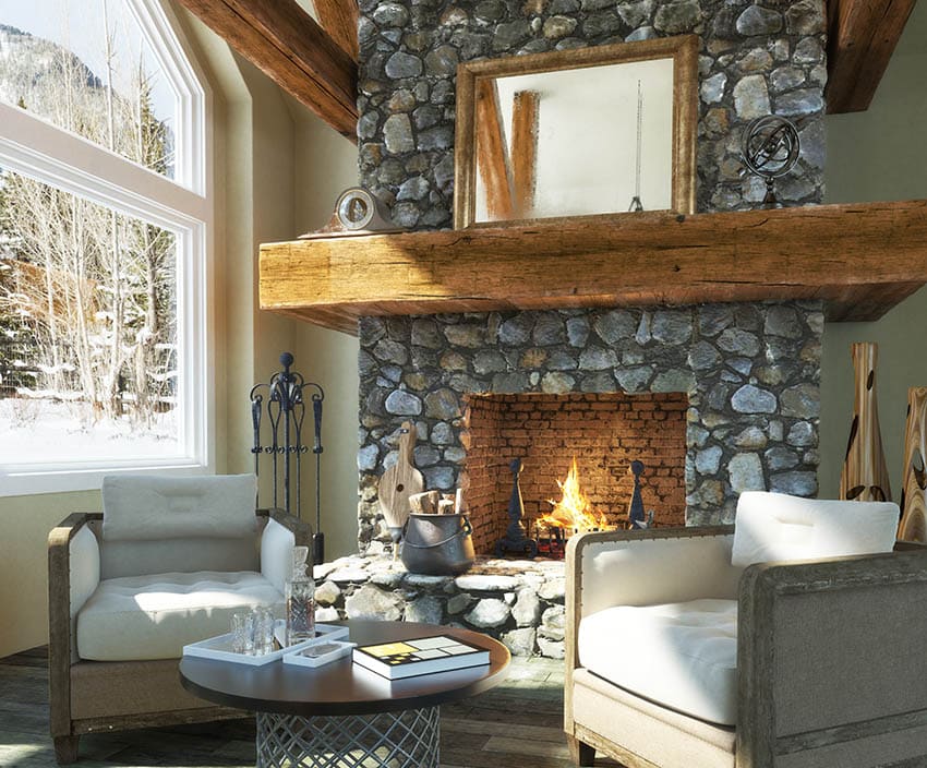 Rustic living room stone fireplace with wood mantel