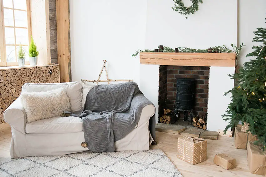 Scandinavian living room with fireplace and hickory wood mantle